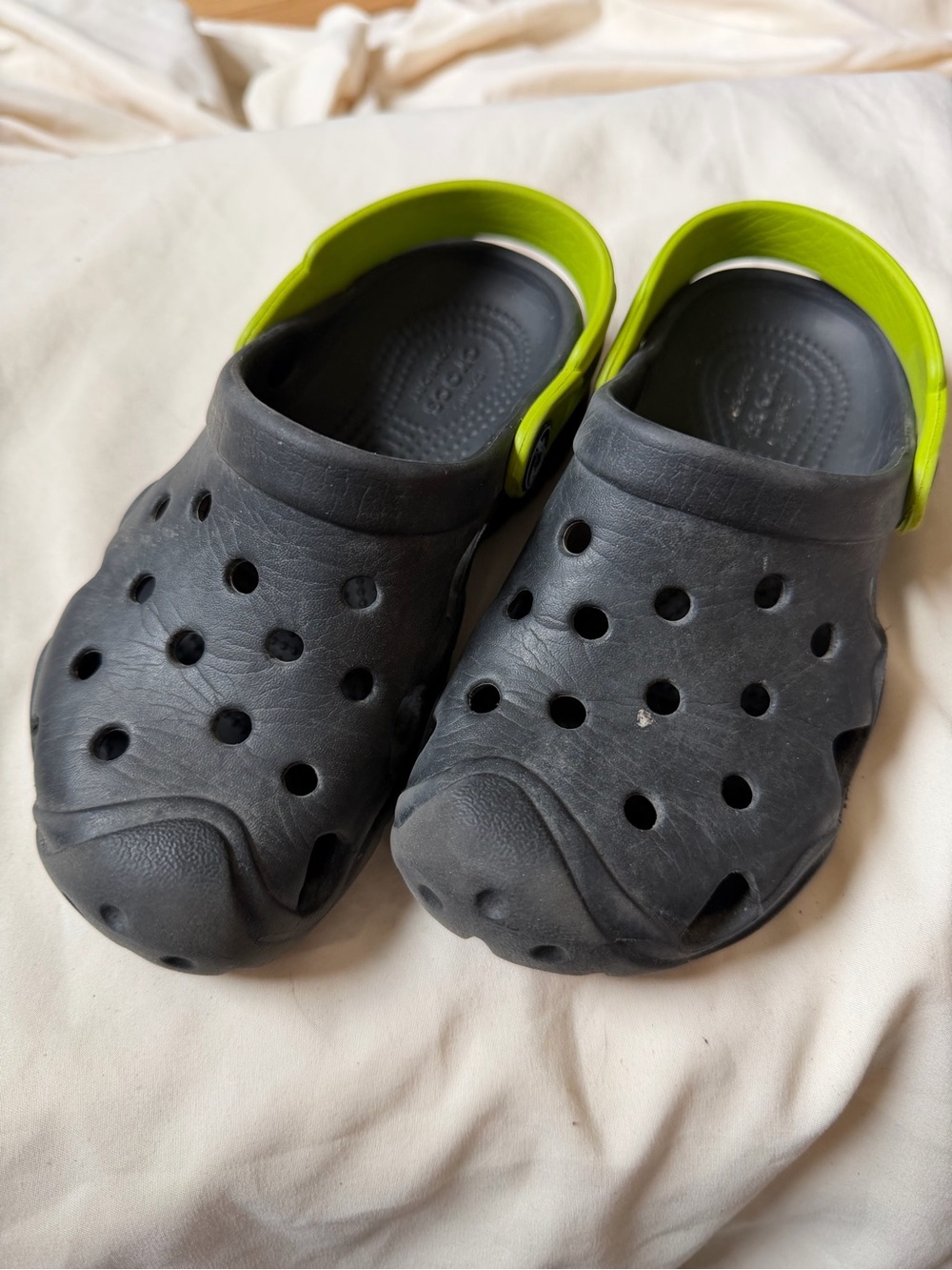 CROCS Kids Black Clogs with Lime Green Heel Strap